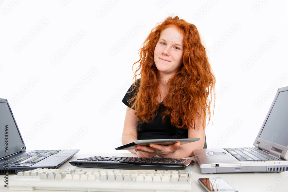 red haired girl with a lot of computer red haired girl with a lot of computer