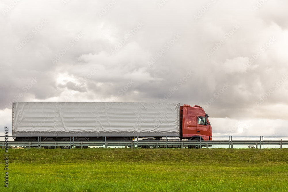 Obraz premium Trucks delivery cargoes