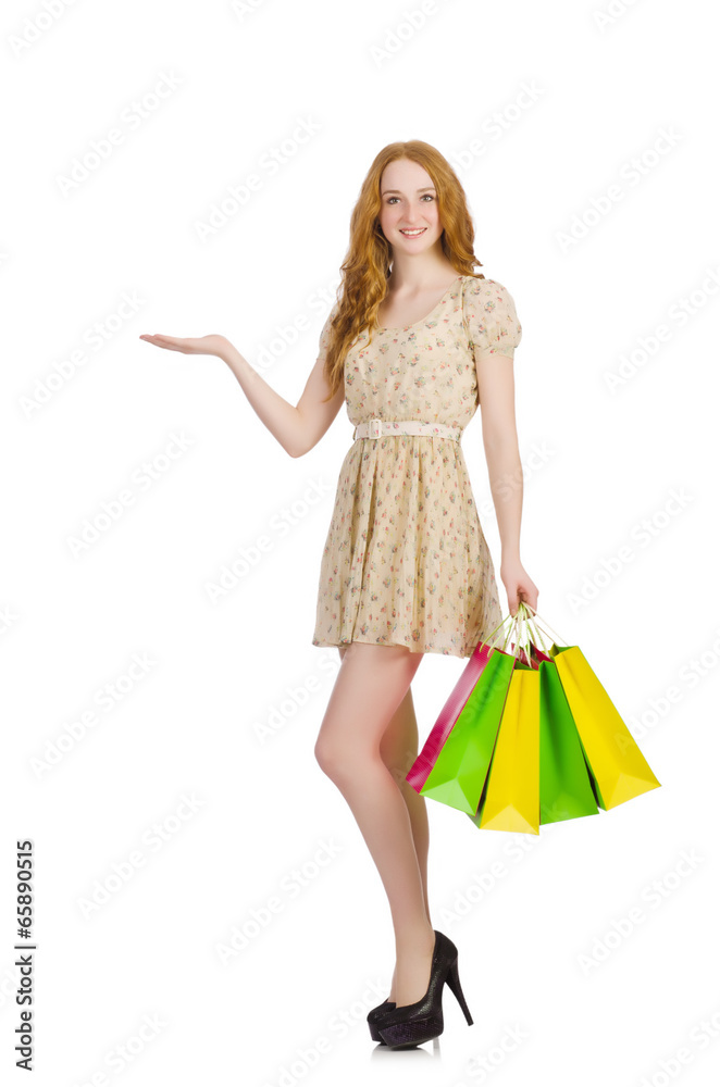 Woman with shopping bags isolated on white Woman with shopping bags isolated on white