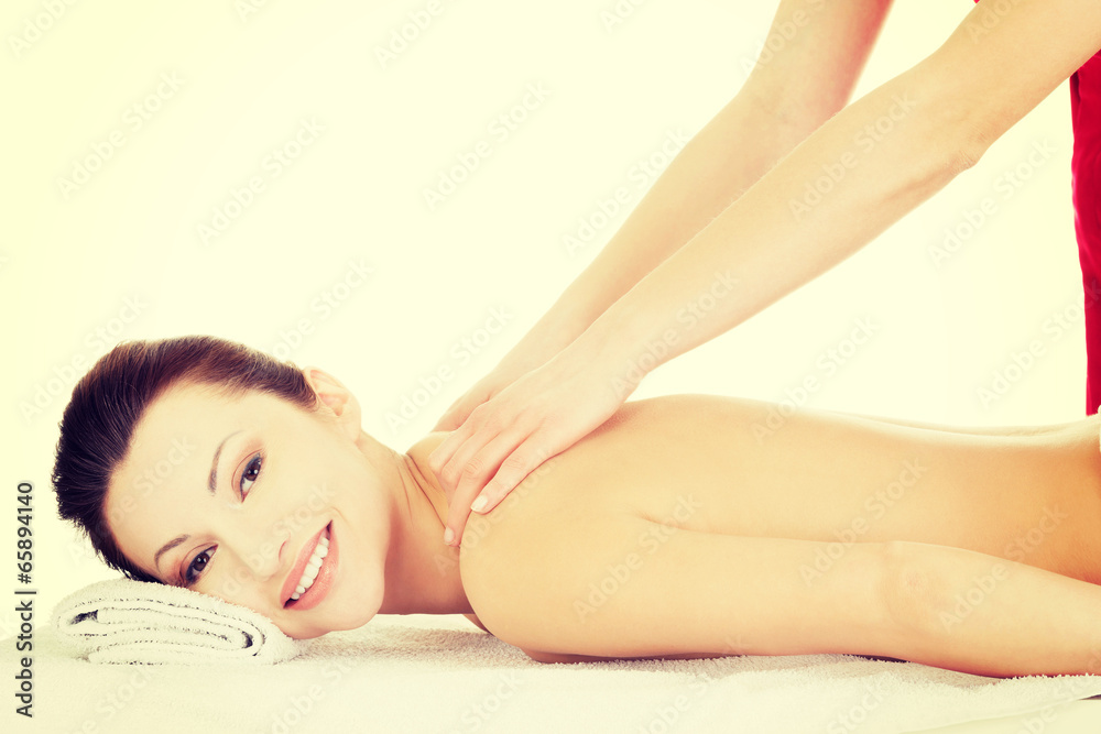 Preaty woman relaxing beeing massaged in spa Preaty woman relaxing beeing massaged in spa