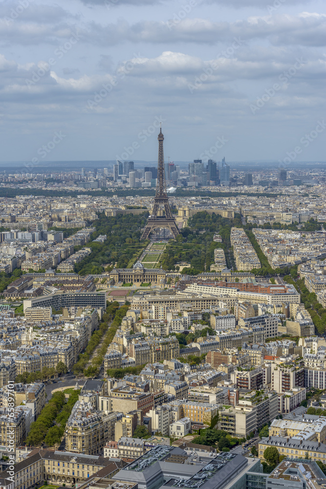 Aerial view of Eiffel Tower and La Defense business district tak