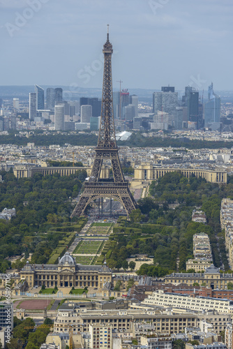 Aerial view of Eiffel Tower and La Defense business district tak