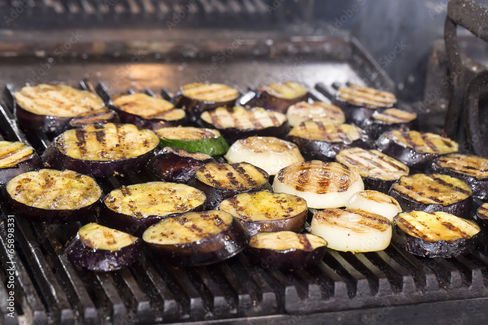 cooking vegetables on the grill in the kitchen at the restaurant cooking vegetables on the grill in the kitchen at the restaurant