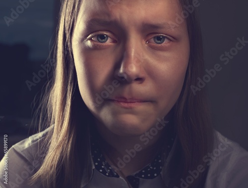 Portrait of a depressed teen girl
