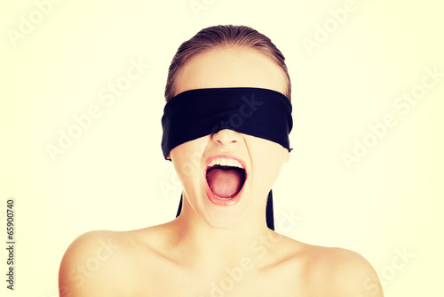 Blindfold woman screaming