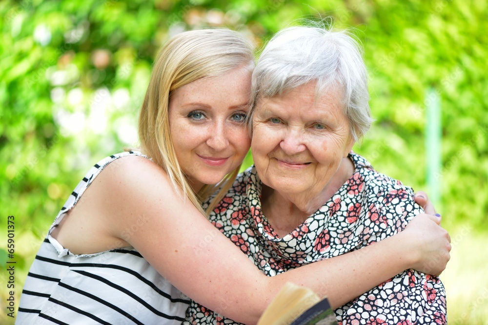 Grandmother and granddaughter. Happy family.