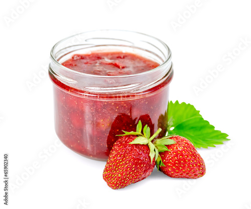 Jam of strawberry with berries and leaf