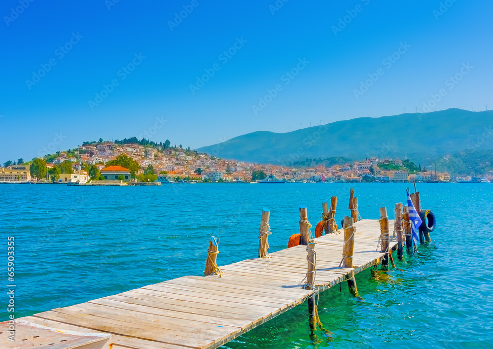 Pier made from wood in Poros island in Greece Pier made from wood in Poros island in Greece
