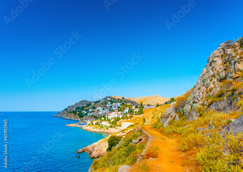 Foto Kamini port a beautiful village in Hydra island in Greece