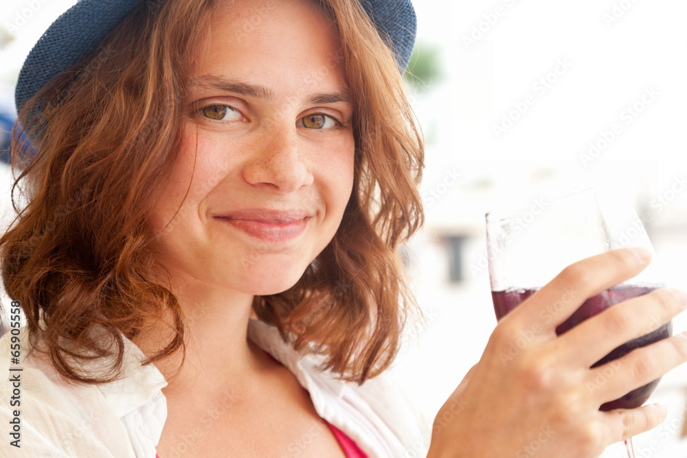 beautiful girl in a hat drinking sangria beautiful girl in a hat drinking sangria