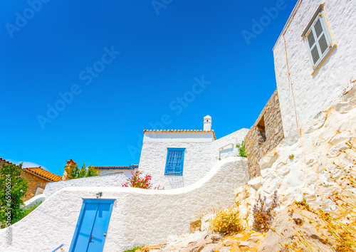 traditional house over the main port of Hydra island in Greece photo