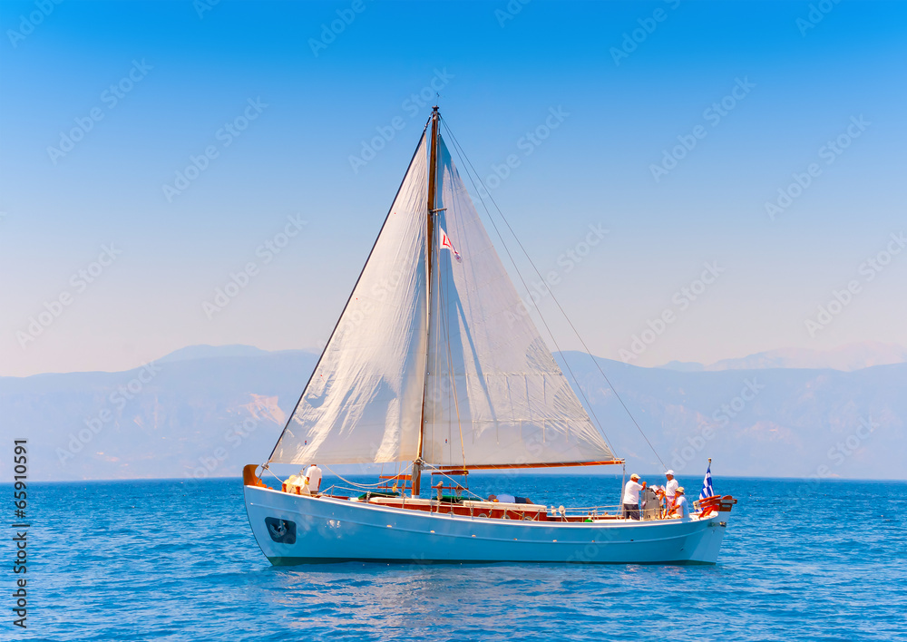 Naklejka premium Classic wooden Greek boat (Kaiki) in Spetses island in Greece