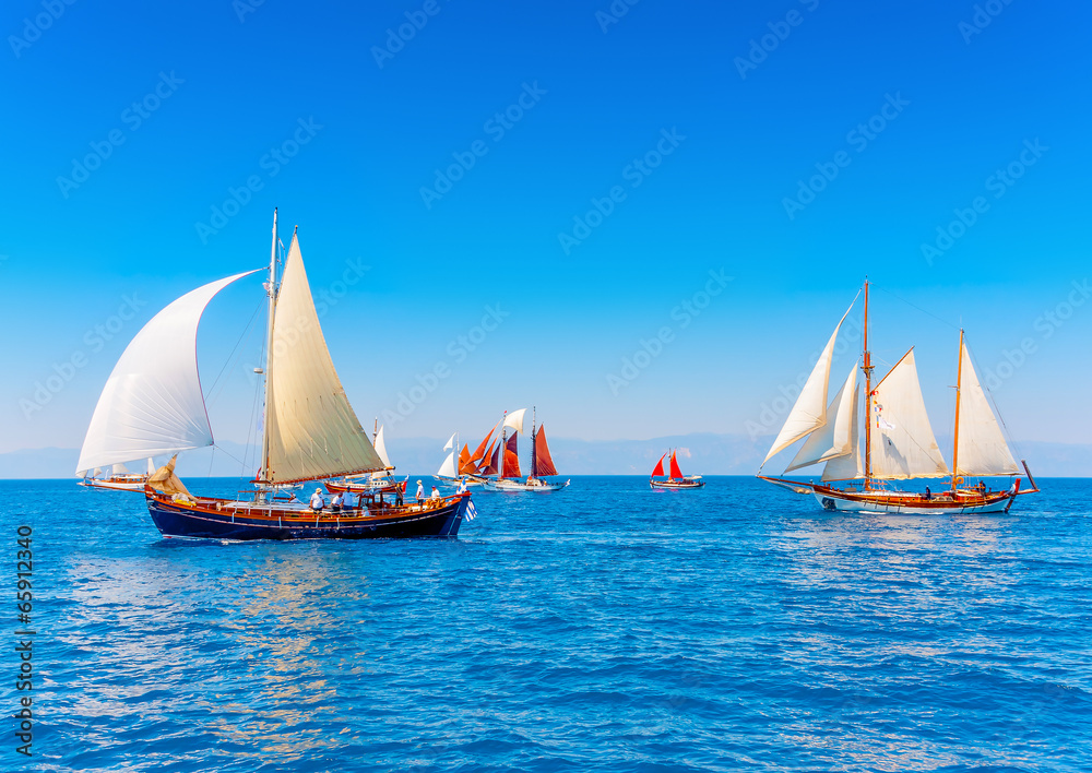 Naklejka premium several old wooden sailing boats in Spetses island in Greece