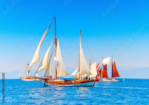 several classic wooden sailing boats in Spetses island in Greece