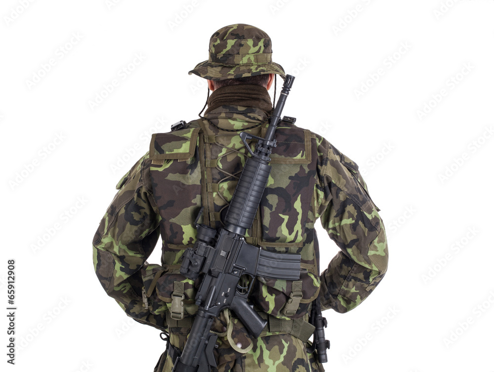 Fototapeta premium Soldier in camouflage and modern weapon M4.