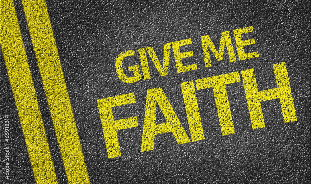 Give me Faith written on the road