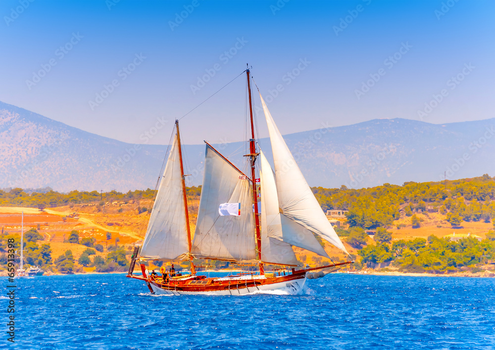 Naklejka premium Old classic wooden sailing boat in Spetses island in Greece