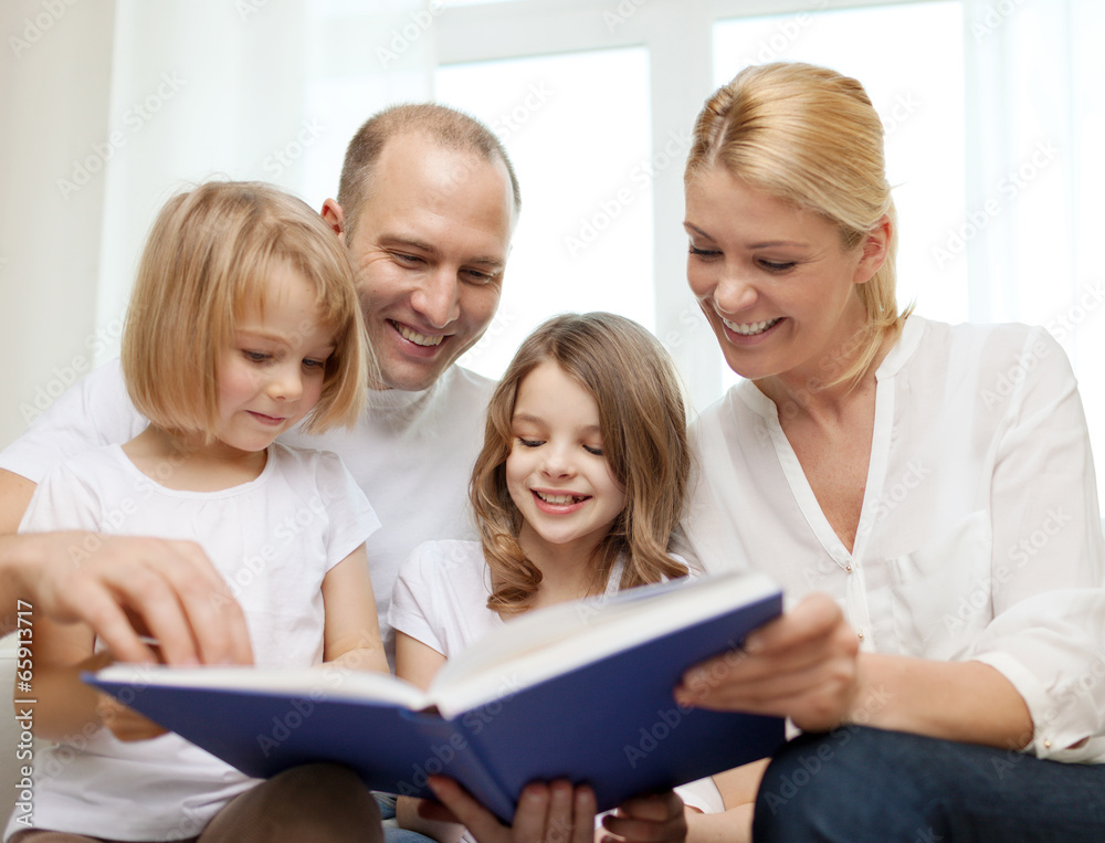 smiling family and two little girls with book smiling family and two little girls with book