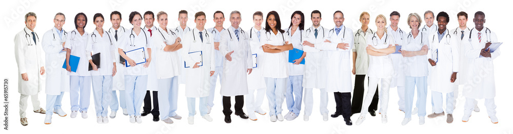 Confident Doctors Against White Background Confident Doctors Against White Background