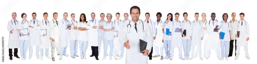 Confident Doctors Against White Background Confident Doctors Against White Background