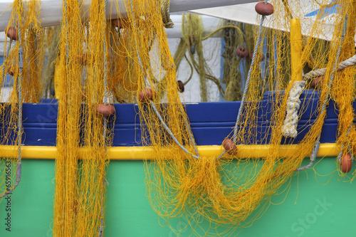 Boot mit Fischernetzen photo