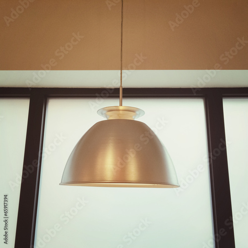 Detail of interior with metal lamp