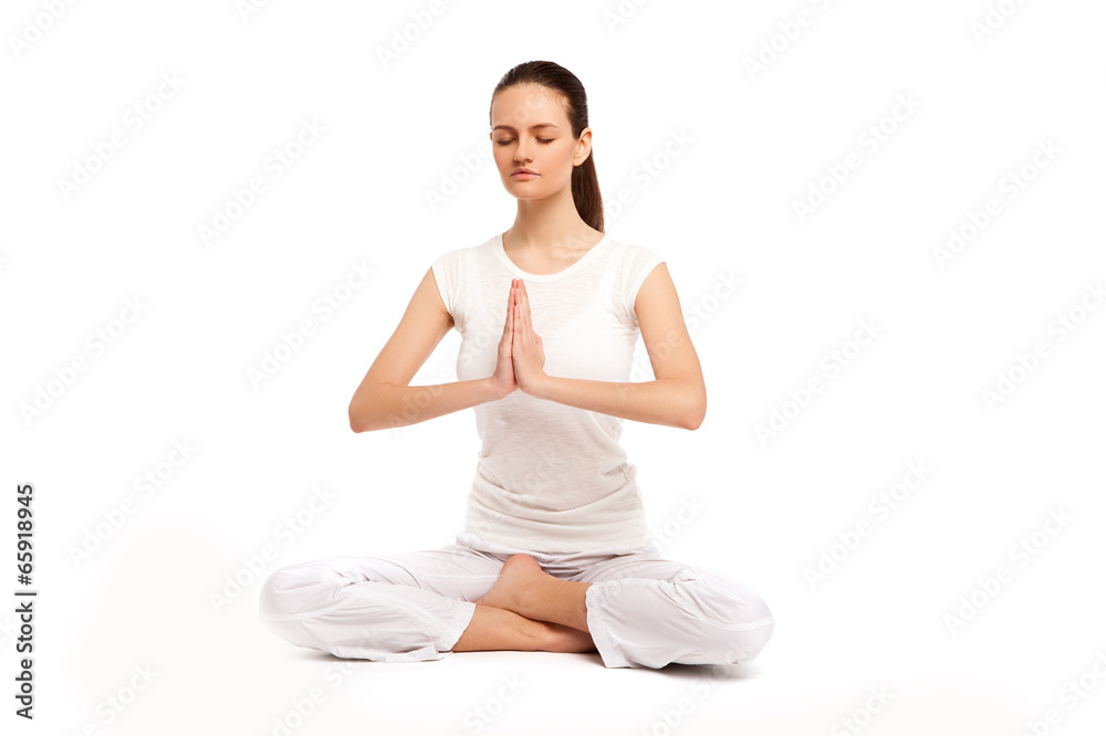 young beautiful yoga posing on a studio background young beautiful yoga posing on a studio background