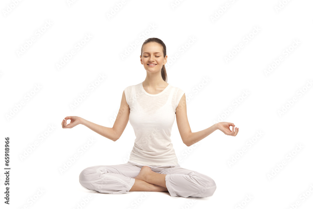 young beautiful yoga posing on a studio background11