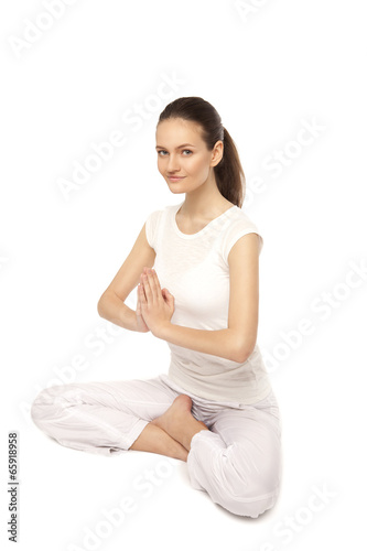 young beautiful yoga posing on a studio background6