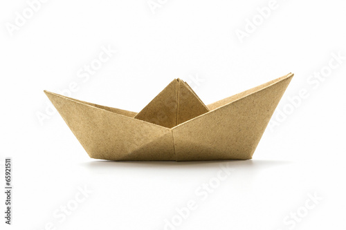Paper origami brown boat .