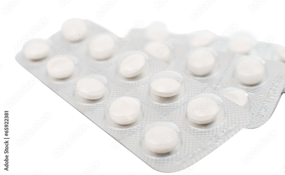 Tablets in packing isolated on white background Tablets in packing isolated on white background