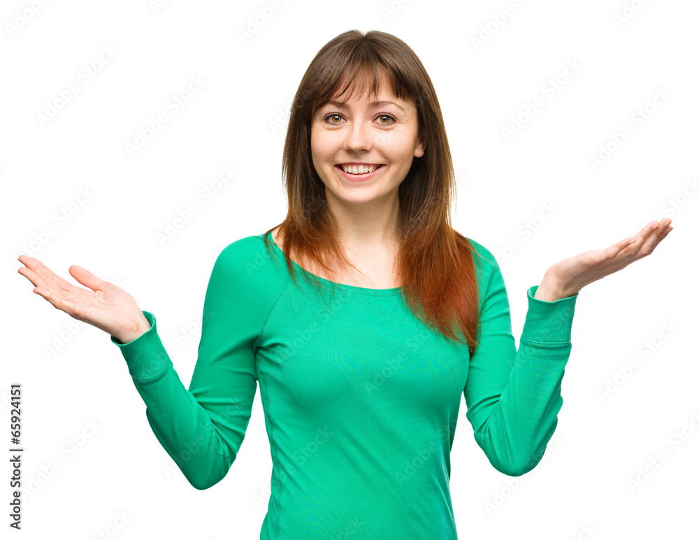Portrait of a young woman raised her hands up Portrait of a young woman raised her hands up