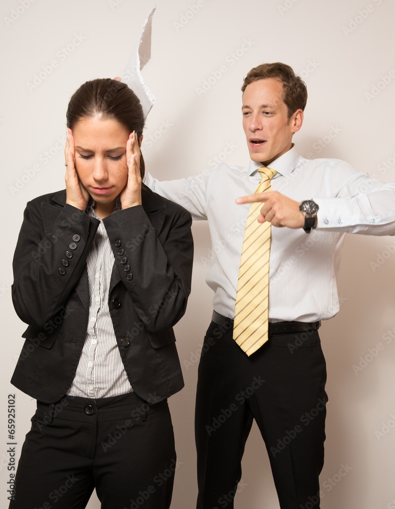 Angry businessman and failed businesswoman