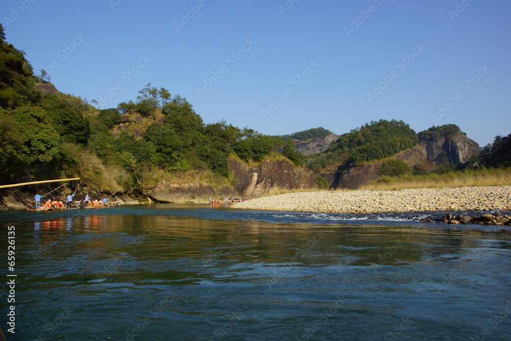 Bamboo rafting in Wuyishan mountains, China Bamboo rafting in Wuyishan mountains, China