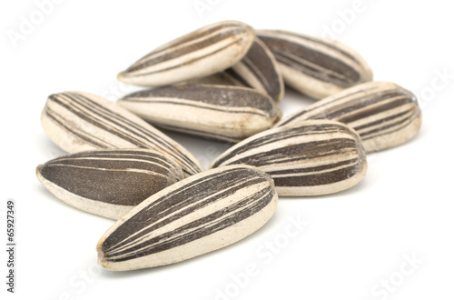 Fotografie Sunflower seeds isolated on white background
