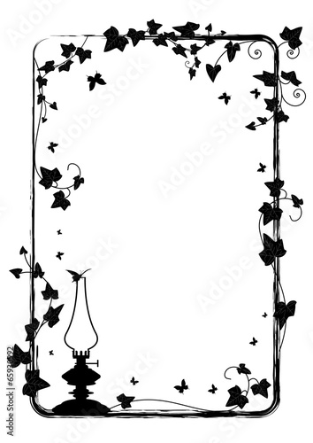 ivy frame with  kerosene lamp