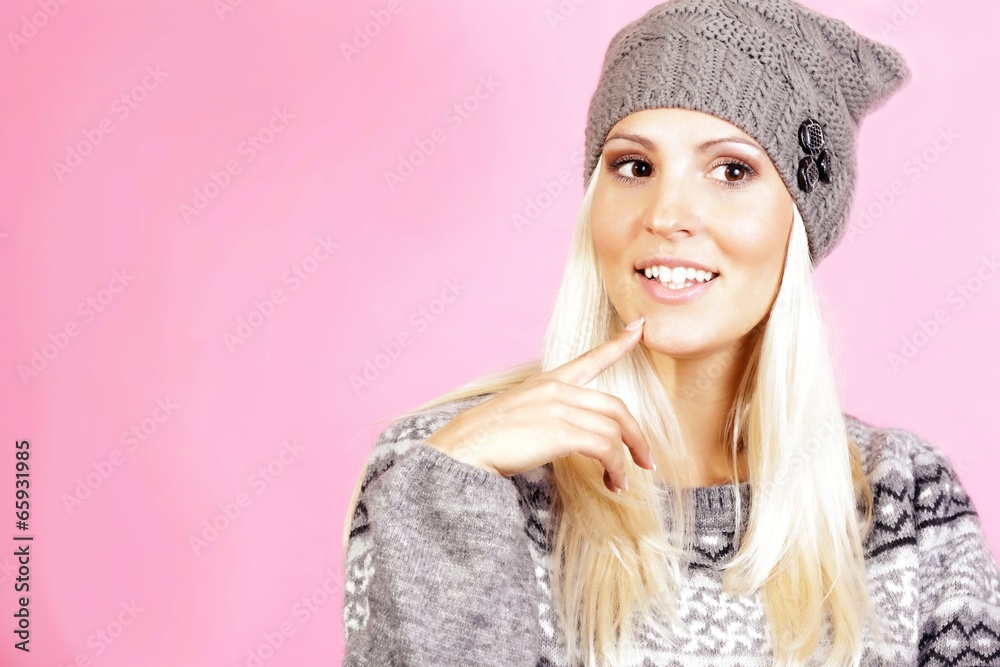 Cute light hair girl dressed in winter clothing,smiling Cute light hair girl dressed in winter clothing,smiling