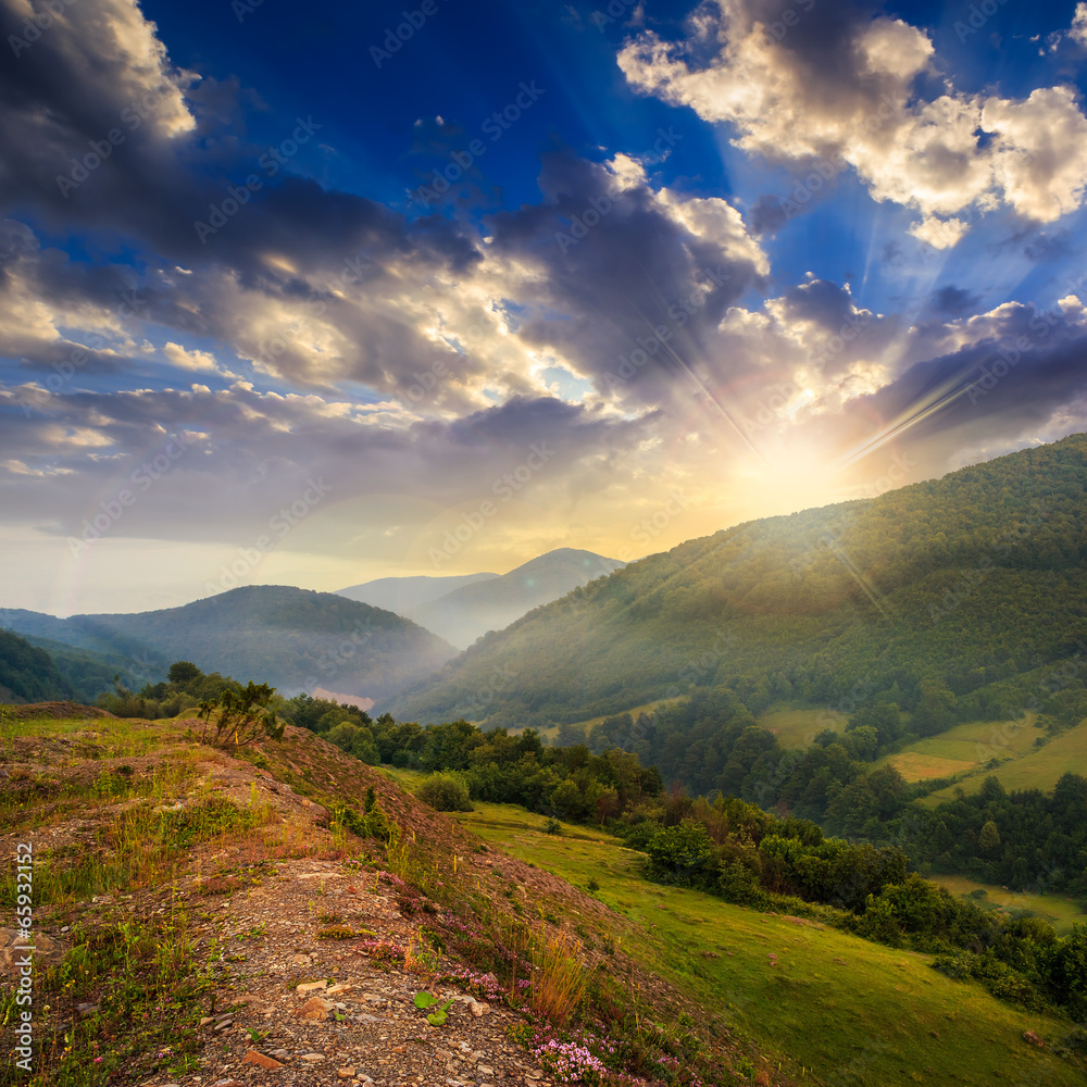 cold fog in mountains at sunset