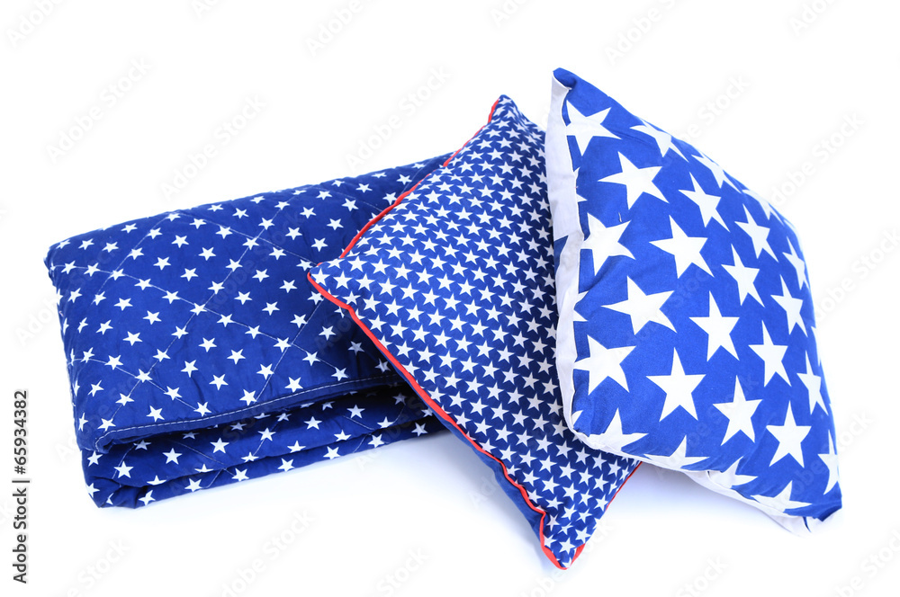 Bright pillows and plaid isolated on white Bright pillows and plaid isolated on white