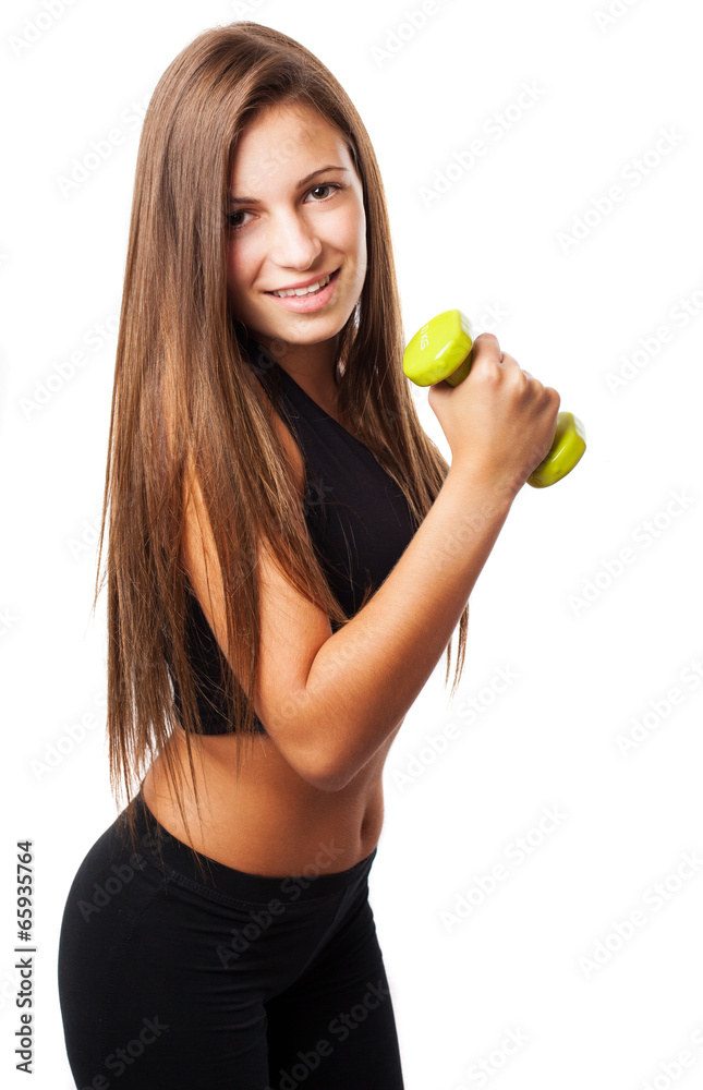 Pretty teenager with weights isolated on a white background Pretty teenager with weights isolated on a white background