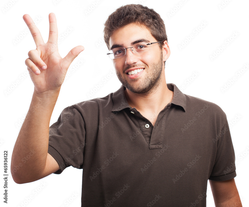 young man counting three on a white background young man counting three on a white background