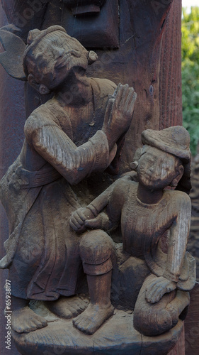 Little statuette. Shwe Inbin Abbey. Mandalay. Myanmar photo