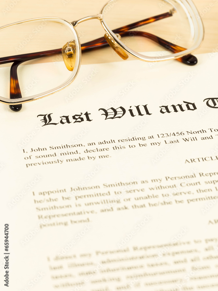 Last will on cream color paper with glasses and pen concept for Last will on cream color paper with glasses and pen concept for