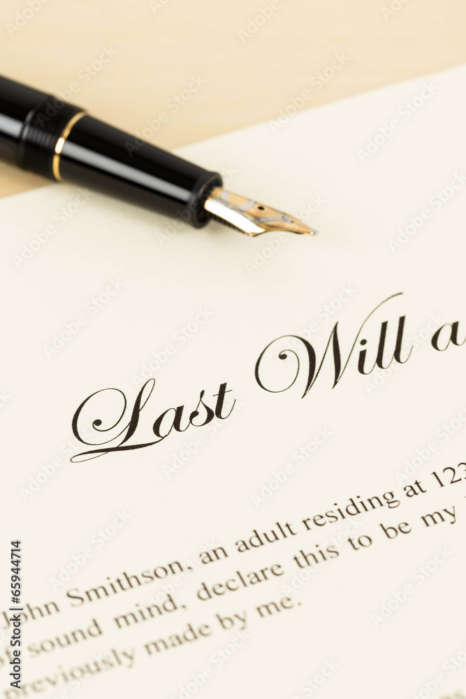Fototapeta premium Last will on cream color paper and pen concept for legal documen