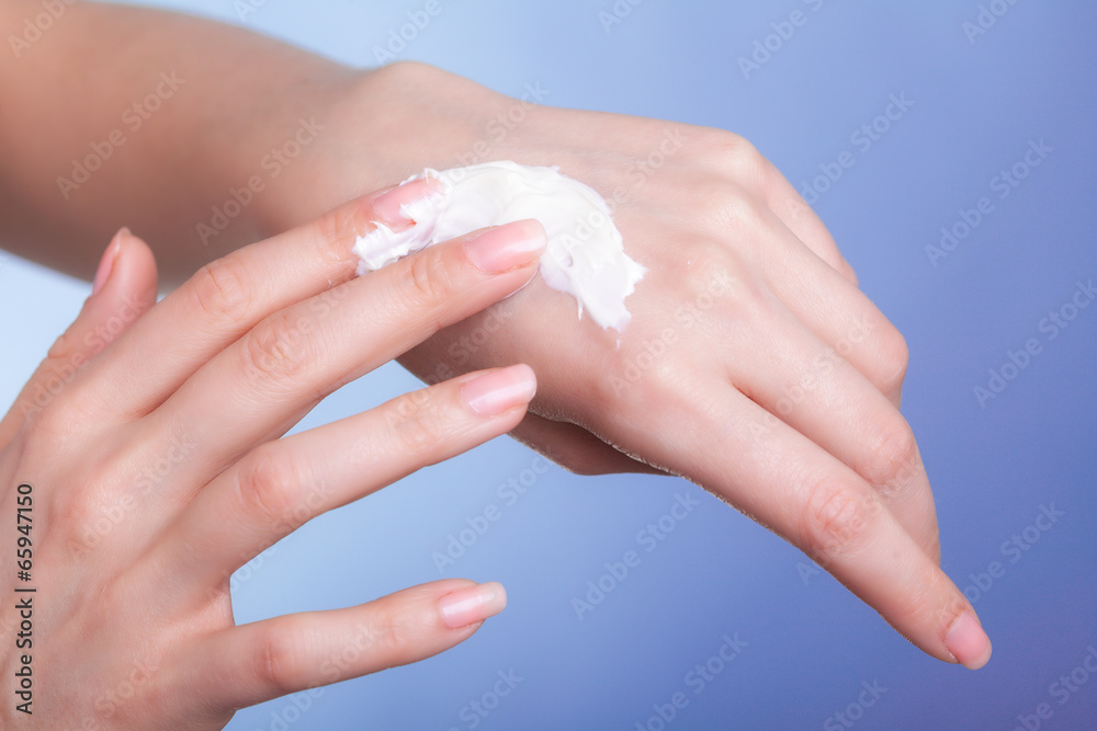 Skin care. Female palms with moisturizing cream.