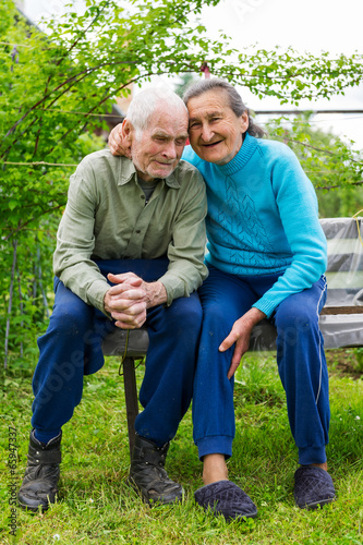 Cute 80 plus year old married couple posing for a portrait © andreaobzerova