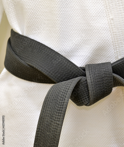 Karate Blackbelt on White Uniform