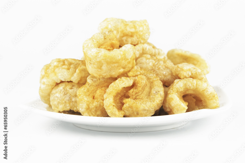 Pork rinds also known as chicharon or chicharrones, deep fried p Pork rinds also known as chicharon or chicharrones, deep fried p
