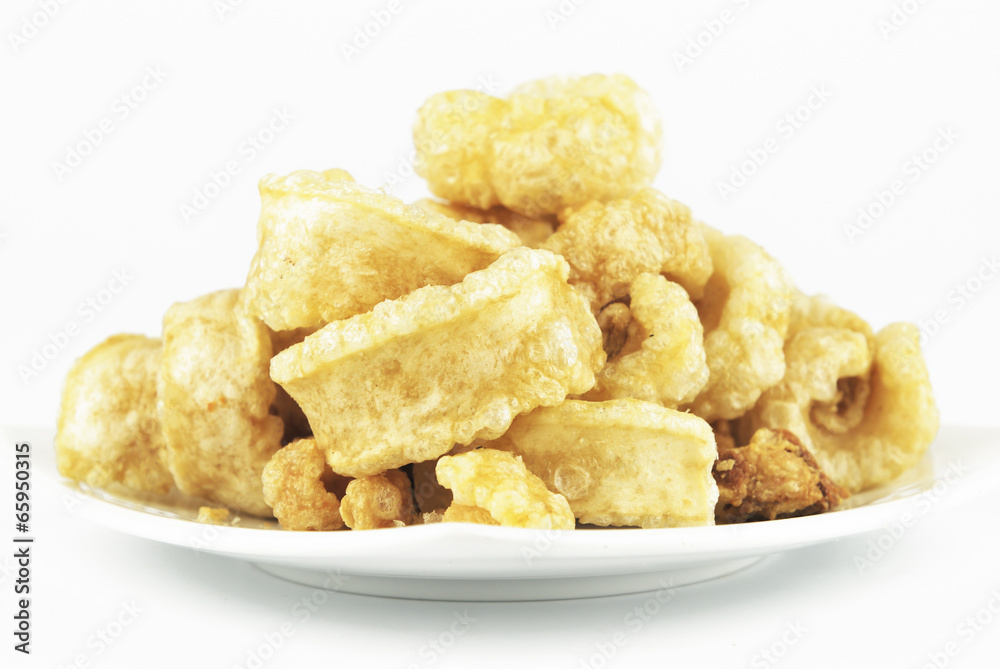 Pork rinds also known as chicharon or chicharrones, deep fried p Pork rinds also known as chicharon or chicharrones, deep fried p