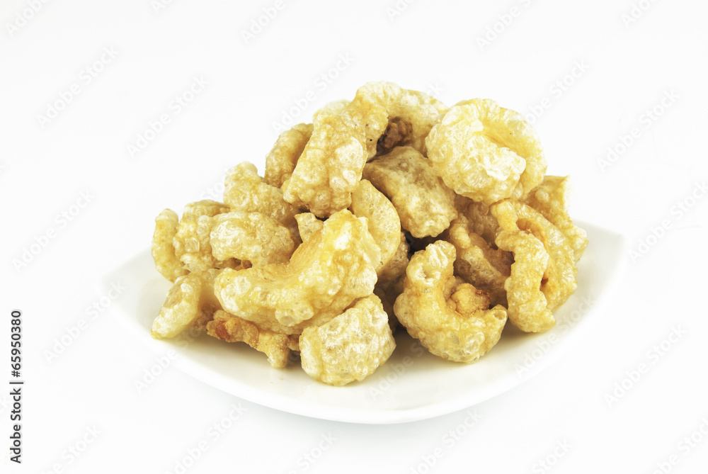 Pork rinds also known as chicharon or chicharrones, deep fried p Pork rinds also known as chicharon or chicharrones, deep fried p